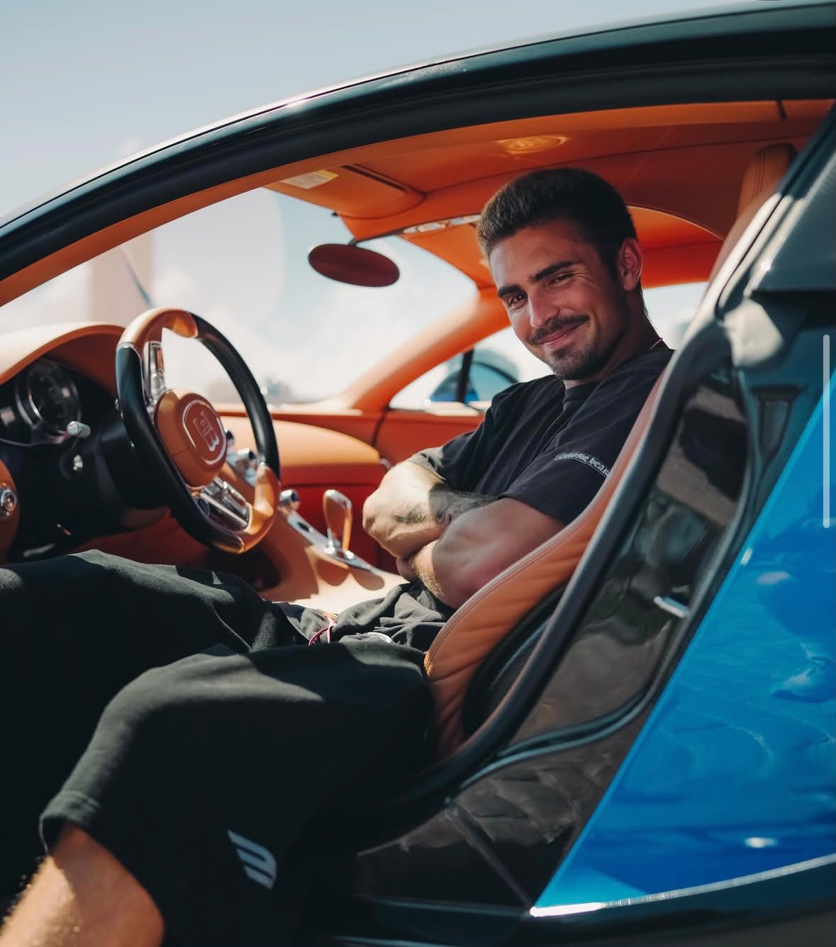 Tier 3 — The Syndicate: ultra-high-net-worth member in a Bugatti